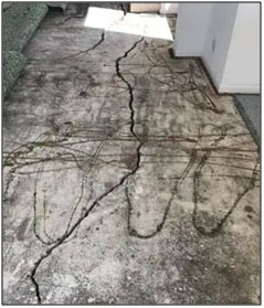 Lifted flatwork due to foundation heave